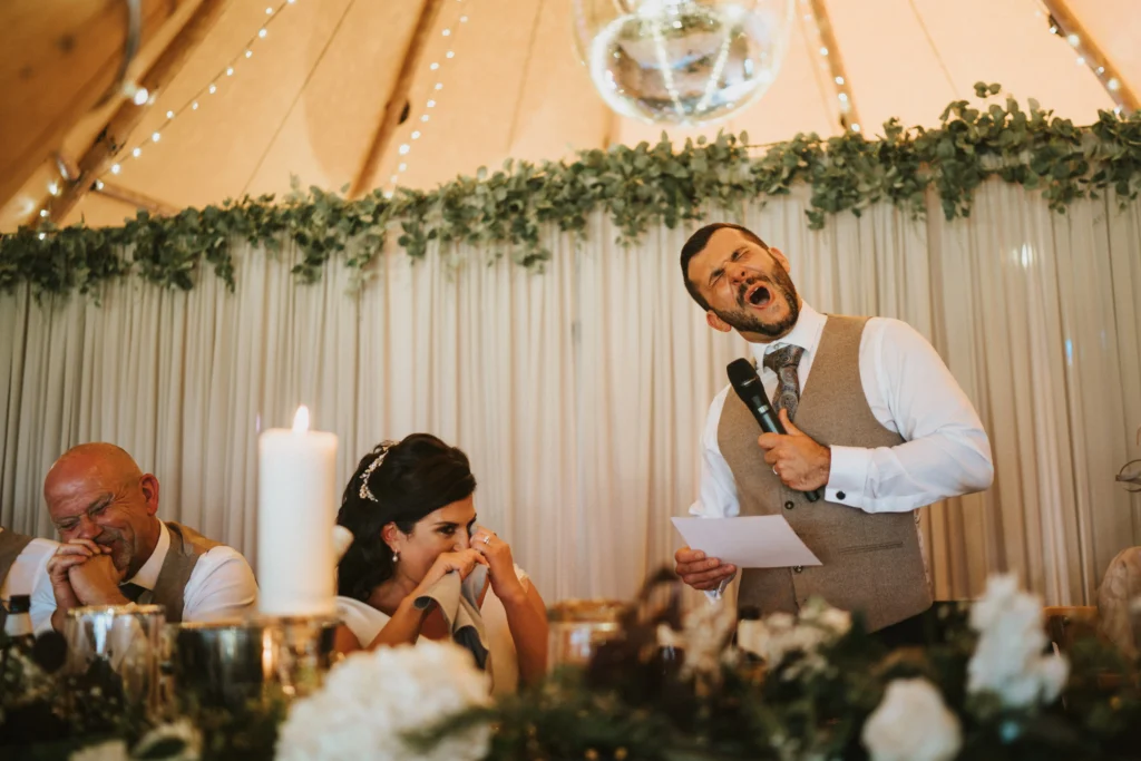 The groom making a face whilst doing his speech. A wedding full of personality creates a fun relaxed wedding everyone enjoys.